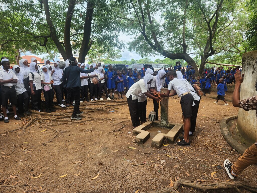Secondary Sch Pupils at Alharkan washing their hands